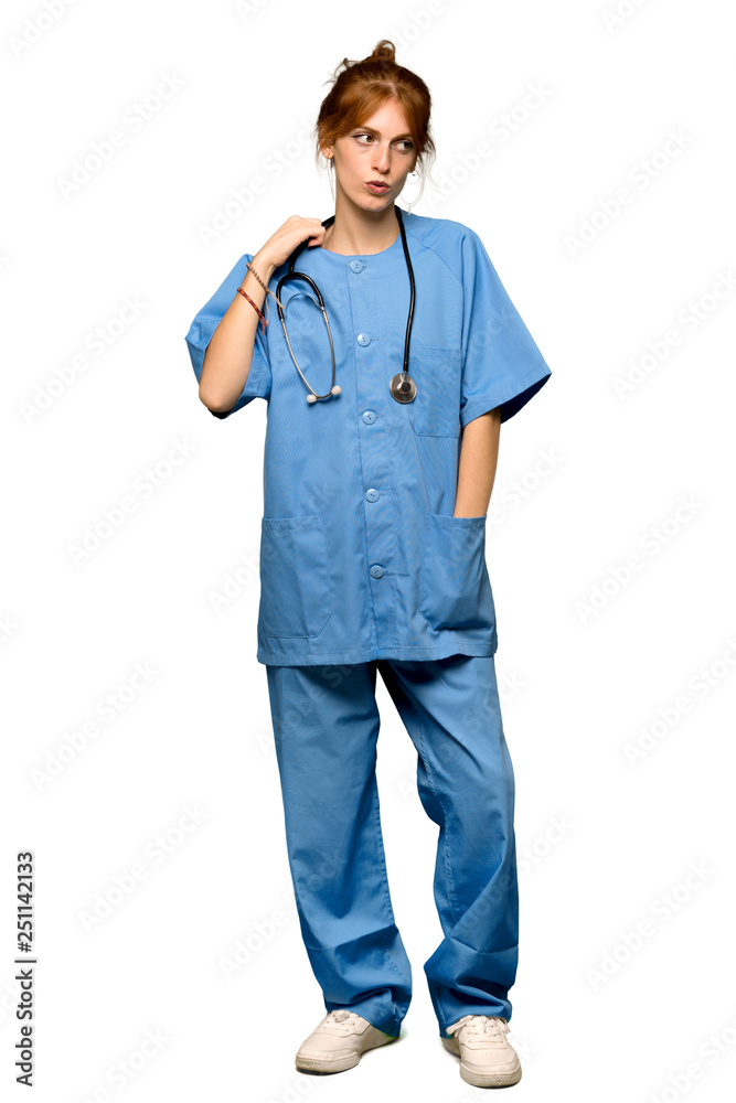 A full-length shot of a Young redhead nurse with a lot of heat over isolated white background