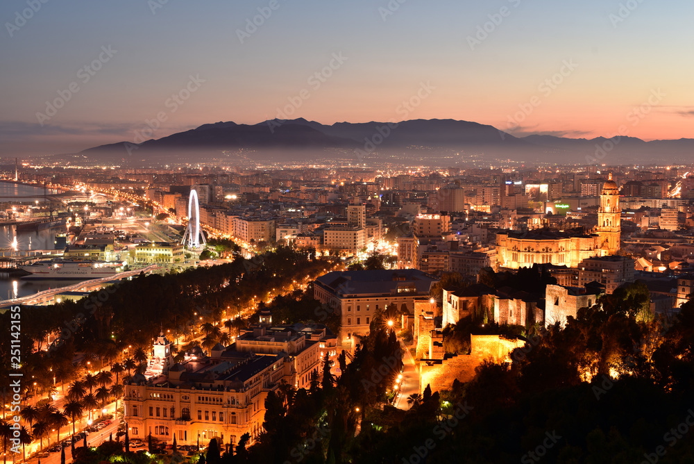 Malaga Old Town, scenic view of the Cathedral and Port Harbour at sunset, Spain Malaga Old Town, scenic view of the Cathedral and Port Harbour at sunset, Spain