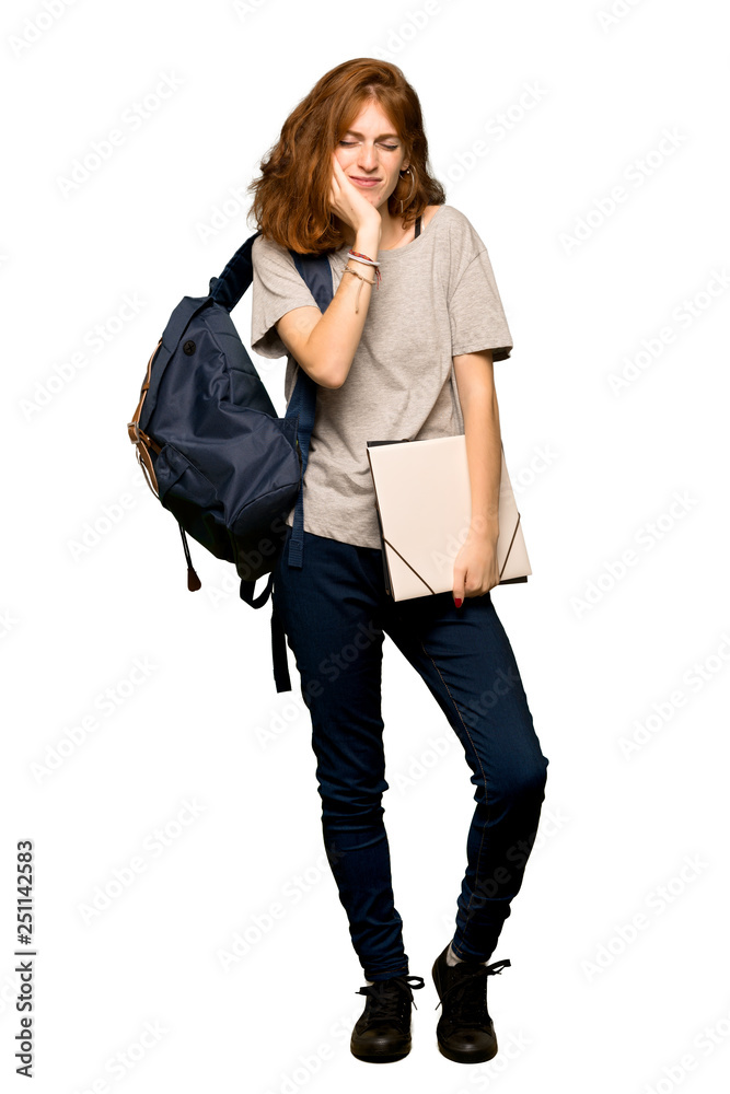 Fototapeta premium A full-length shot of a Young redhead student with toothache over isolated white background