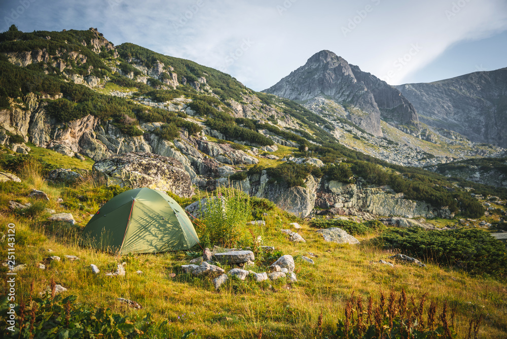 Camping in the Seven Rila lakes, Bulgaria. Tent in the nature, camping and a beautiful mountain. Camping in the Seven Rila lakes, Bulgaria. Tent in the nature, camping and a beautiful mountain.