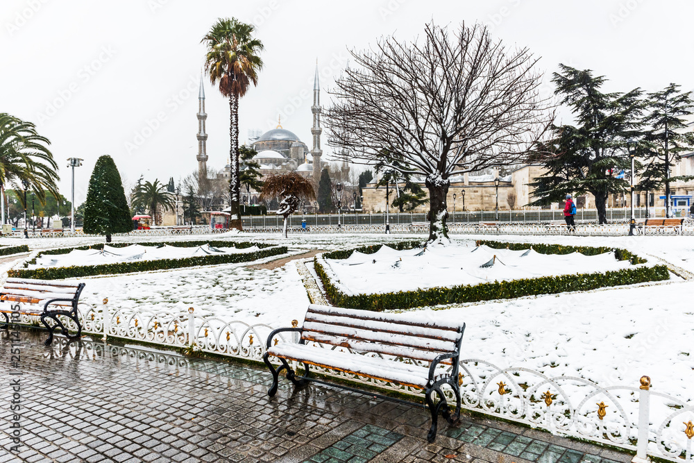 Snowy day in Sultanahmet Square and Blue Mosque (Sultanahmet Camii). Istanbul, Turkey.. Snowy day in Sultanahmet Square and Blue Mosque (Sultanahmet Camii). Istanbul, Turkey..