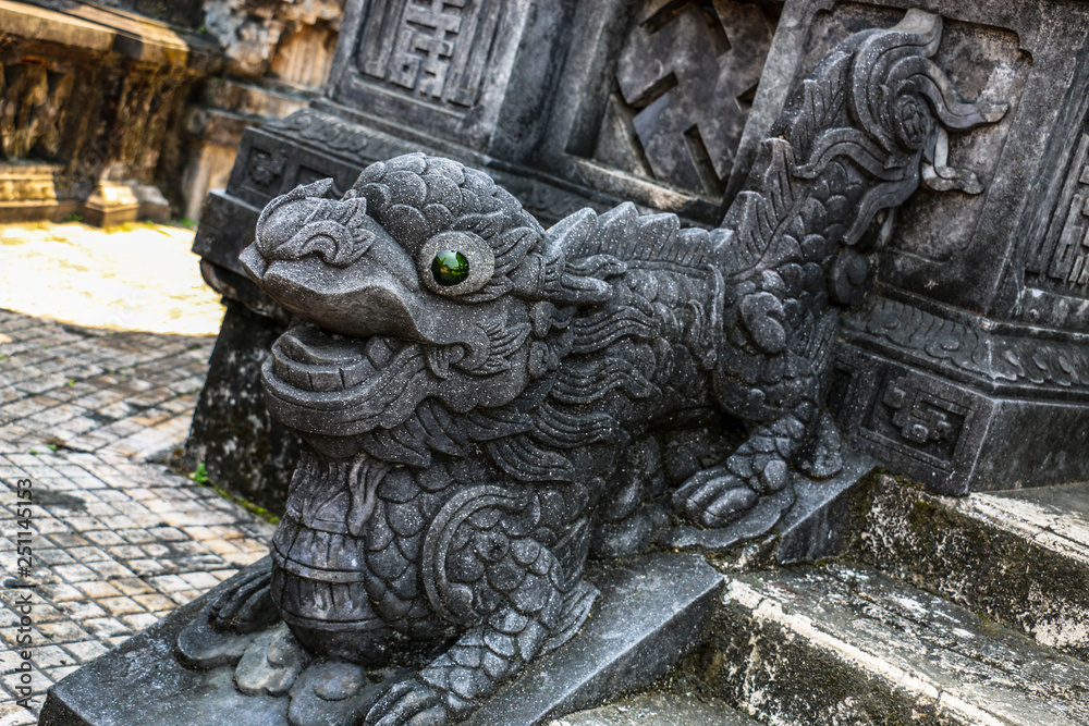 Dragon statue in complex Tomb of Emperor Khai Dinh, Hue, Vietnam Dragon statue in complex Tomb of Emperor Khai Dinh, Hue, Vietnam