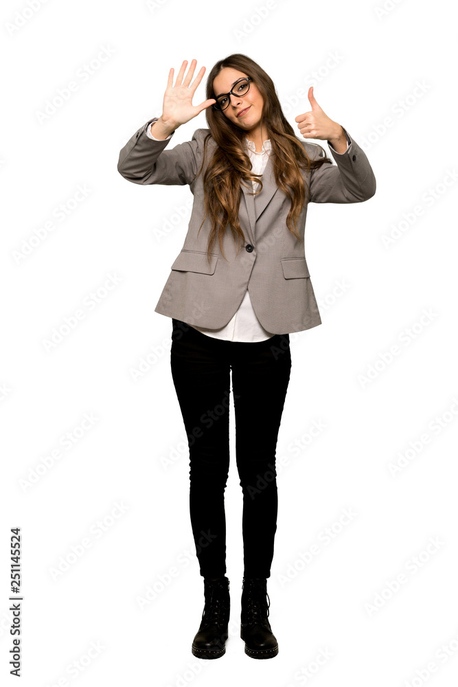 Full-length shot of Business woman counting six with fingers on isolated white background Full-length shot of Business woman counting six with fingers on isolated white background