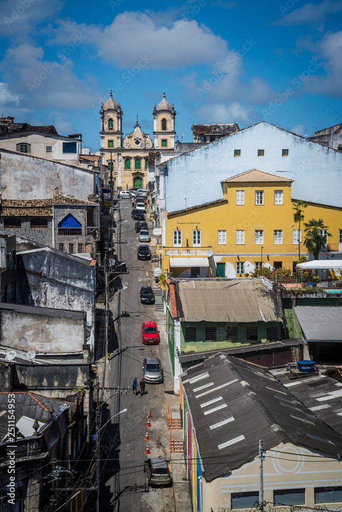 One of many Baroque churches at top of the hilly street in the historic centre of Pelourinho, Salvador, Bahia, Brazil