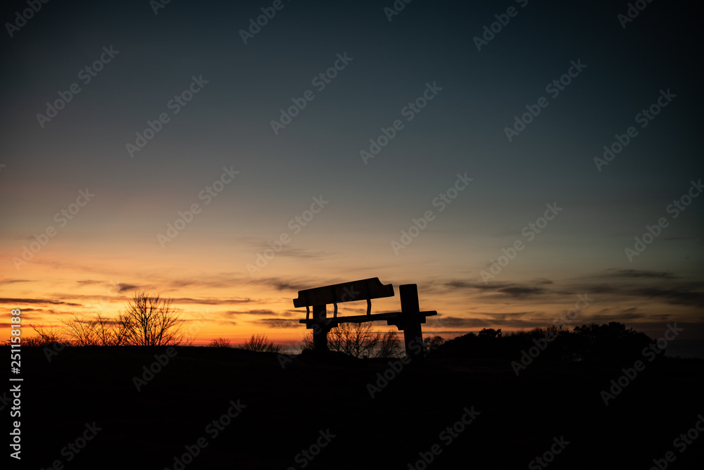 Bench with a view. Sunset. House of Knud Rasmussen, Hundested. Bench with a view. Sunset. House of Knud Rasmussen, Hundested.