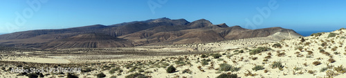 Sand dunes and mountain range