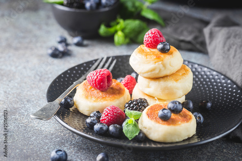 Cottage cheese pancakes with berries. Healthy Breakfast.