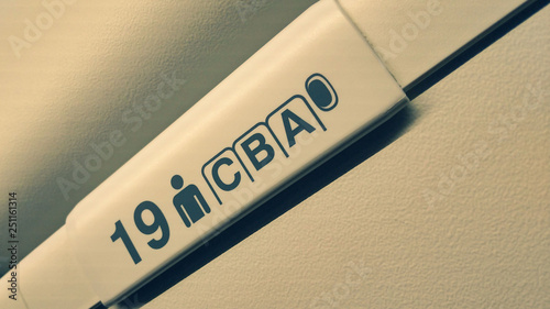 seat numbers on luggage shells inside the passenger airplane