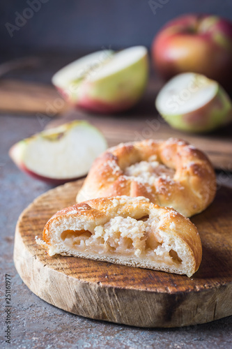 Fresh homemade small patties with apple stuffing. © petrrgoskov