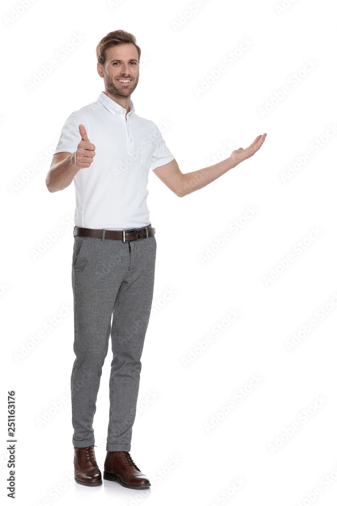 smiling man presenting and making the ok sig smiling man presenting and making the ok sig