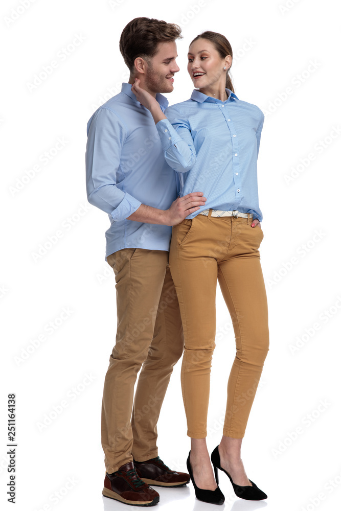embraced casual man and woman looking at each other embraced casual man and woman looking at each other