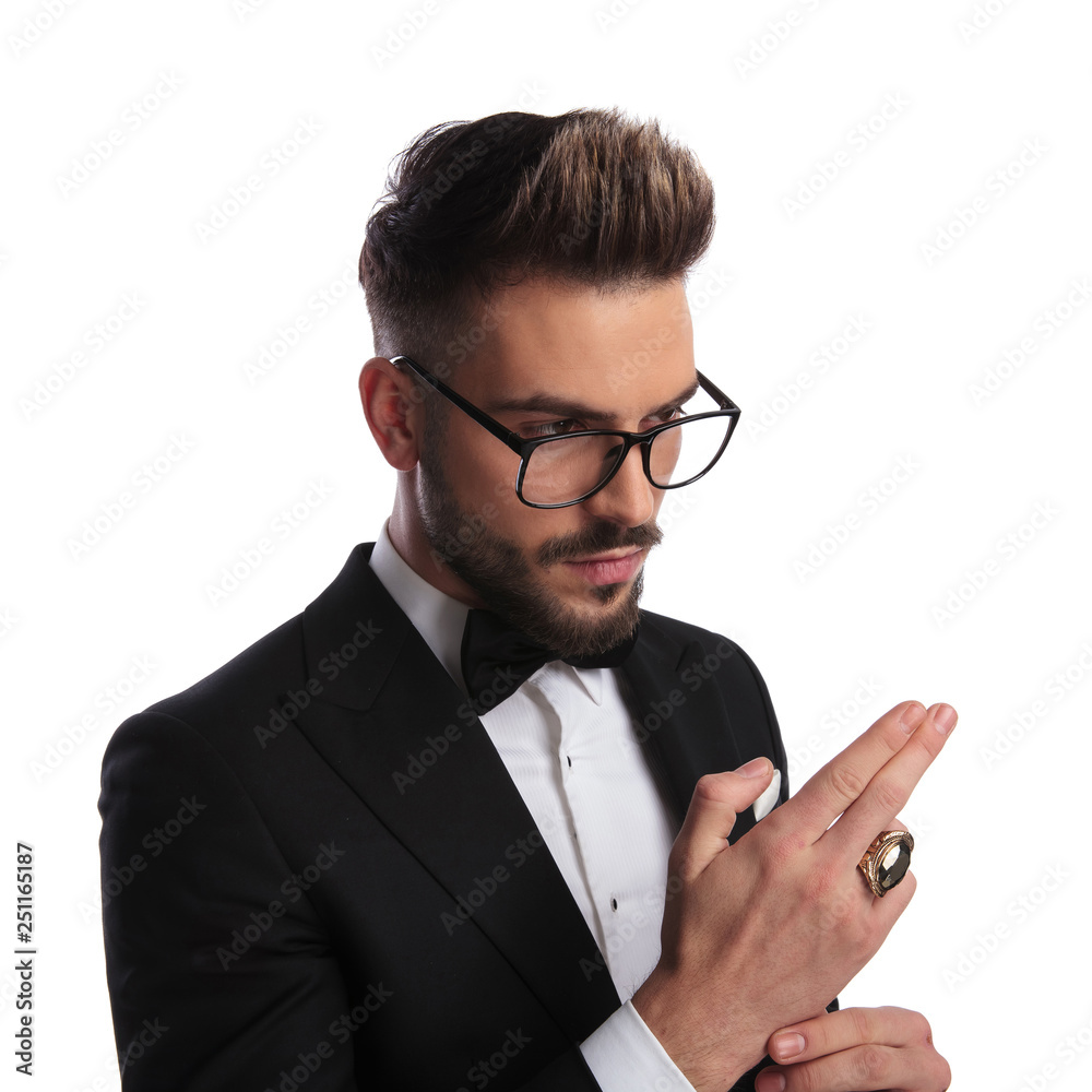 Elegant man arranging his cuff Elegant man arranging his cuff