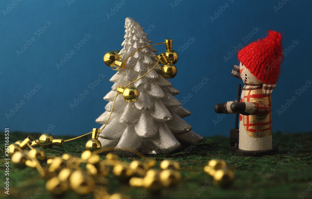 Fototapeta premium christmas tree decoration on blue background