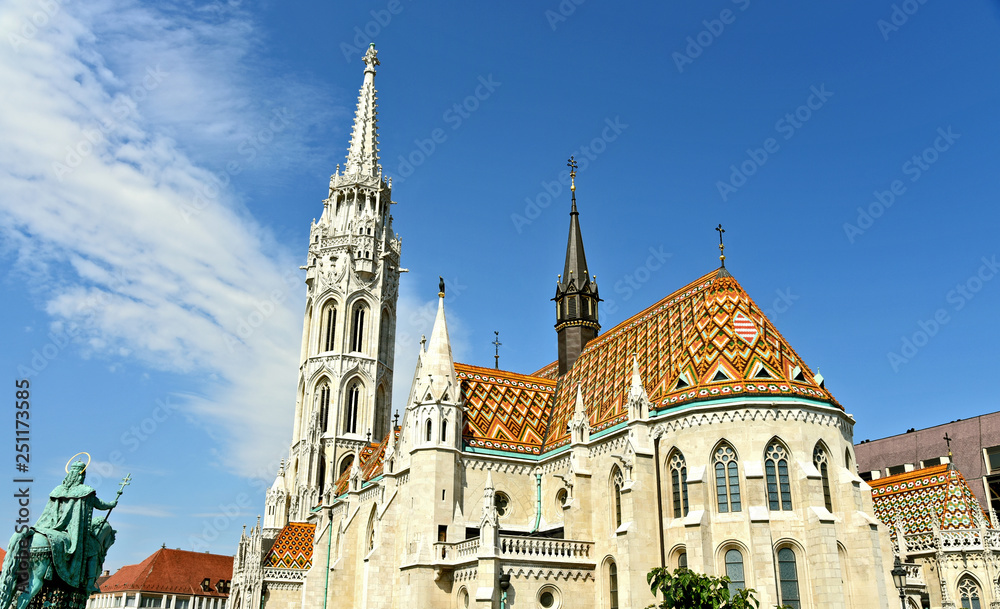 Matthias Church in Budapest with blue sky.