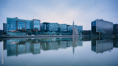 Modern buildings reflected in water at Lindholmen science park gothenburg,sweden