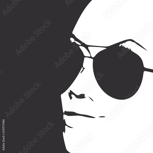 Portrait of beautiful woman in black sunglasses.
