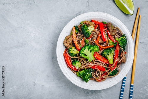 Beef Noodle Stir Fry with broccoli, carrots and red bell peppers photo