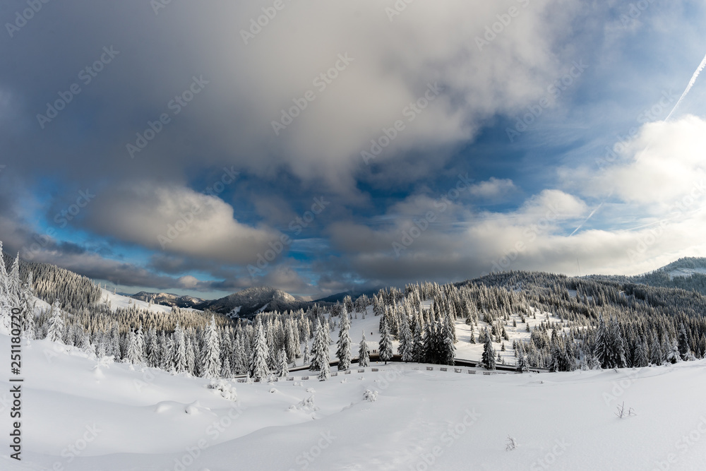 winter mountain landscape with mountains and blue sky