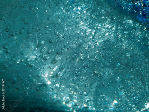 The rystallized ice.blue bubbles Ice close up.