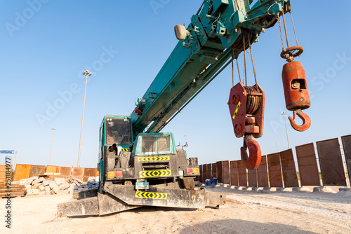 November 12, 2018 - Abu Dhabi, UAE: Detail of monile crane lifting hooks photo