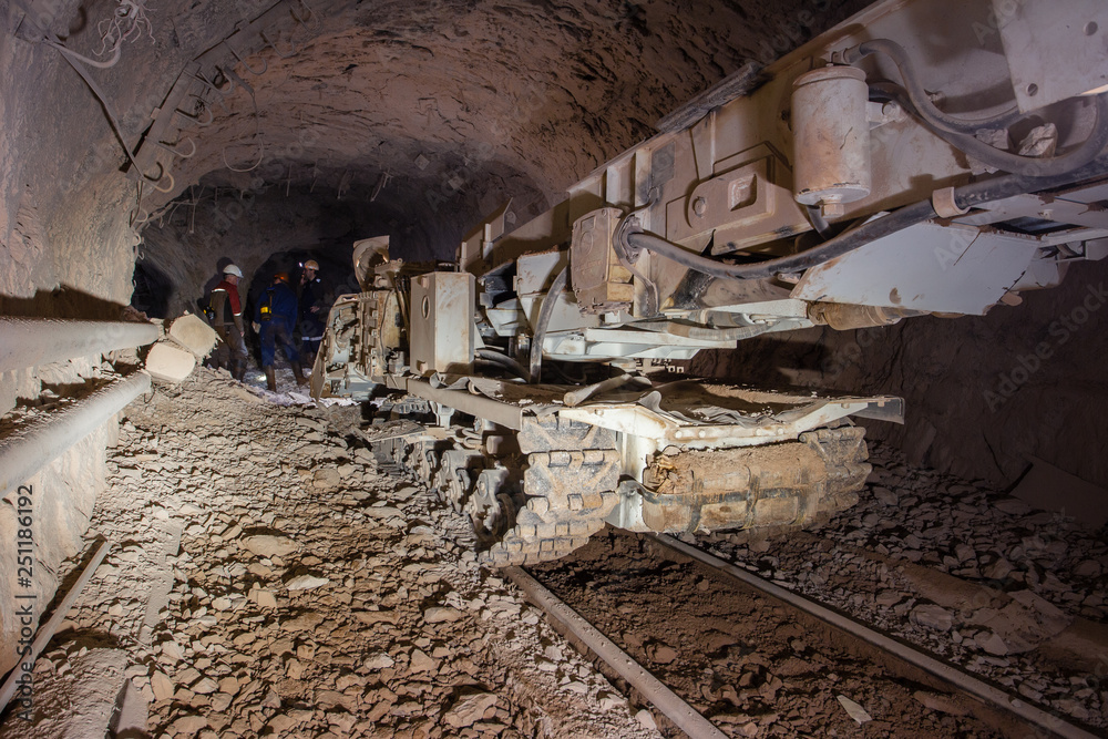 Underground gold ore mine shaft tunnel gallery passage with continious loader