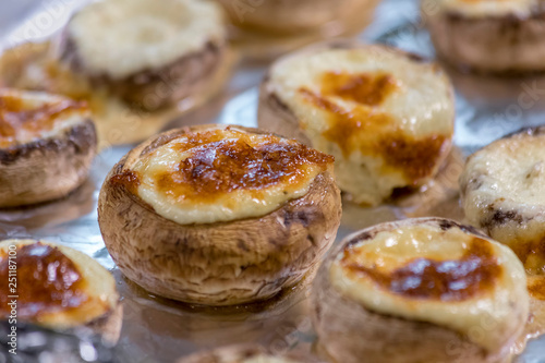 Staffed mashrooms baked in the oven on a foil