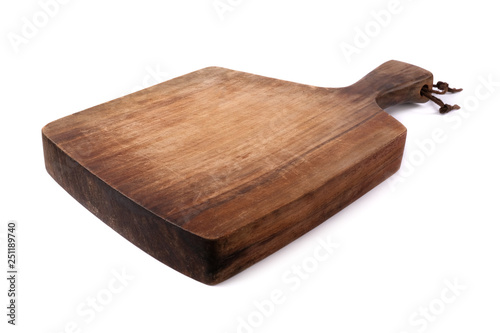 Billede på lærred Old wooden cutting board on a white background.