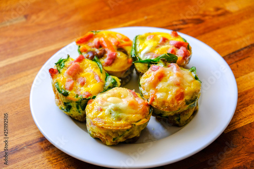 Egg muffins with bacon, spinach, carrot & mushroom