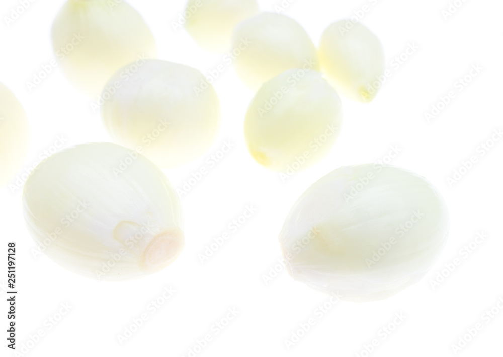 Peeled onions on a white background Peeled onions on a white background