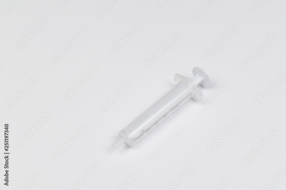 Single use syringe isolated on white Single use syringe isolated on white