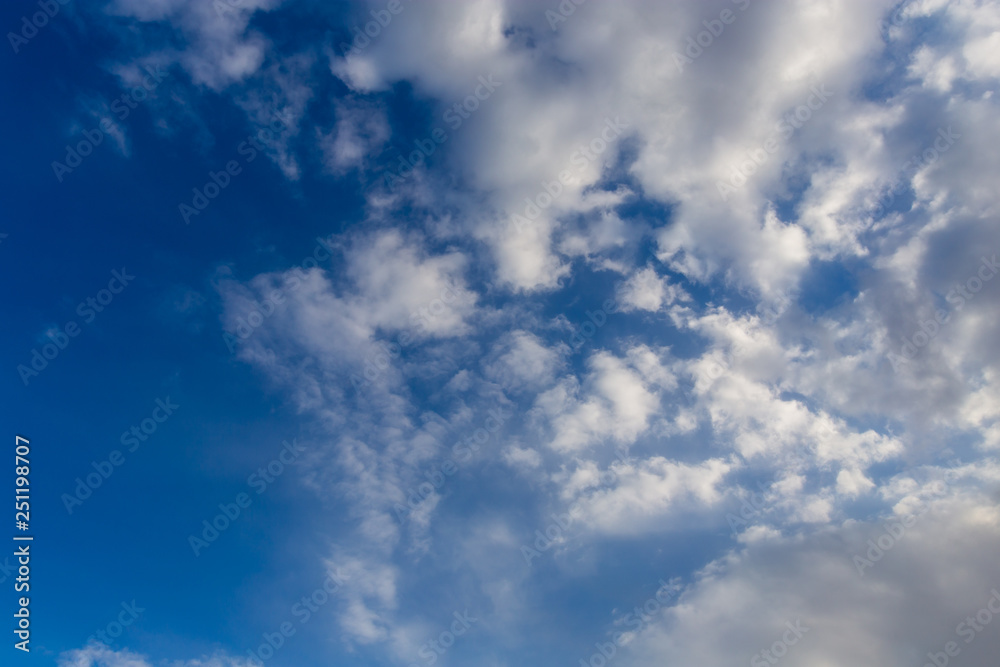 Clouds against blue sky as abstract background