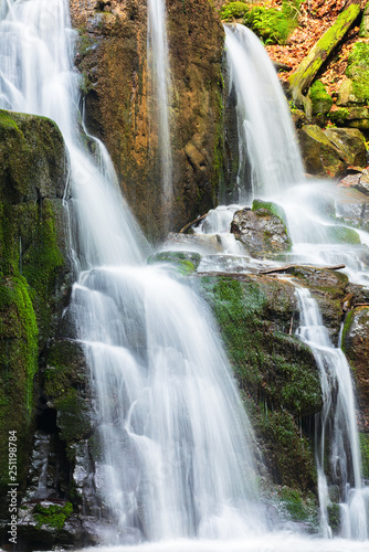waterfall with small cascades. beautiful nature background in summer. long exposure © Pellinni