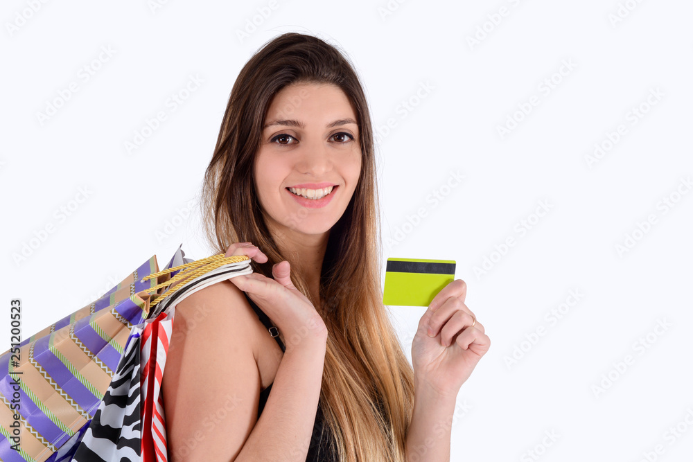 Woman holding shopping bags and credit card. Woman holding shopping bags and credit card.