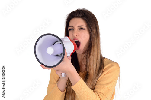 Young woman screaming on a megaphone.