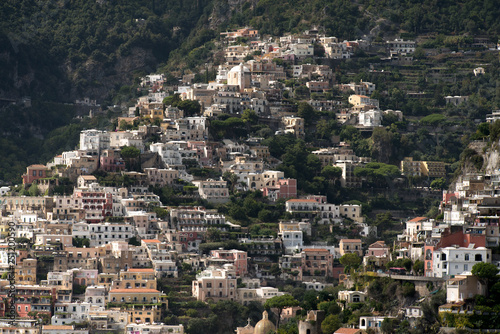 View on a city in mountains near coast. Town at the sea © lookproduction