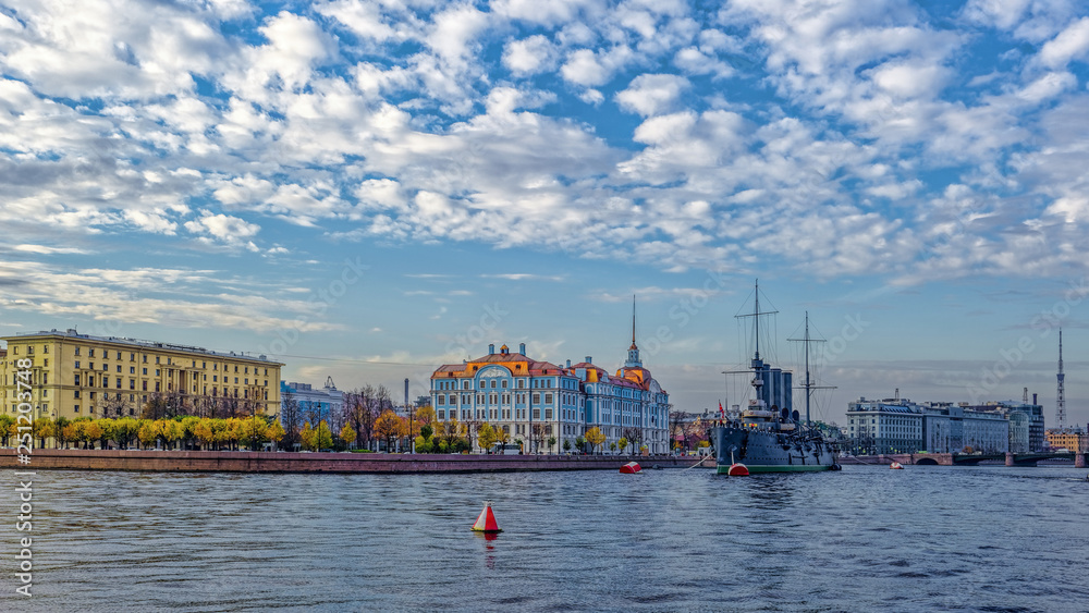 Fototapeta premium Revolutionary ship-museum Cruiser Aurora on the Neva river. The Nakhimov Naval School, St Petersburg, Russia.