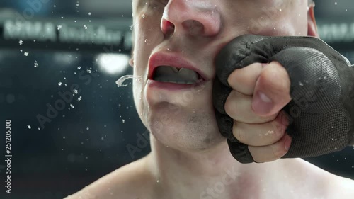 MMA punch, fighter punching hook to the jaw, in super slow motion, highly detailed realistic 3d animation