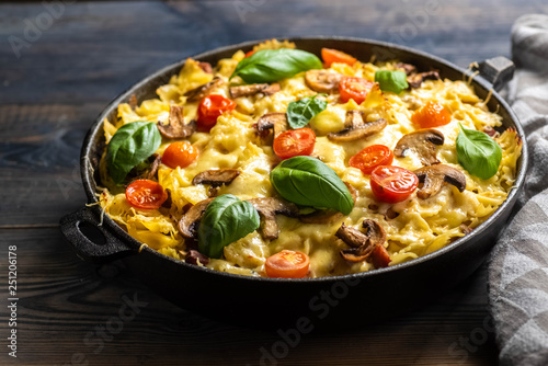 casserole pasta with mushrooms, sausage and cheese