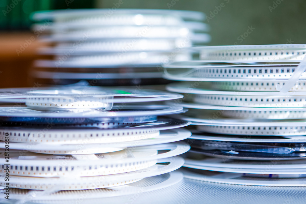 Surface Mount Componentry For Microelectronic Pick and Place Machines in Tapes and Reels.