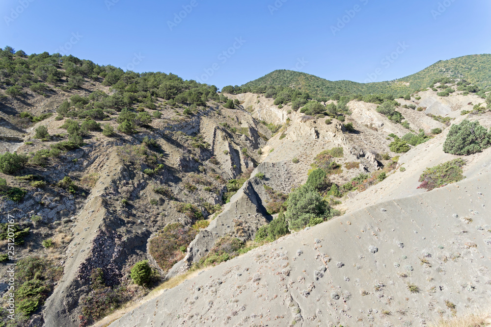 Clay ravines at the foot of the mountains.