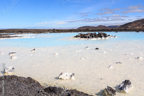 blue lagoon geothermal hot sea waters in cold volcanic lava