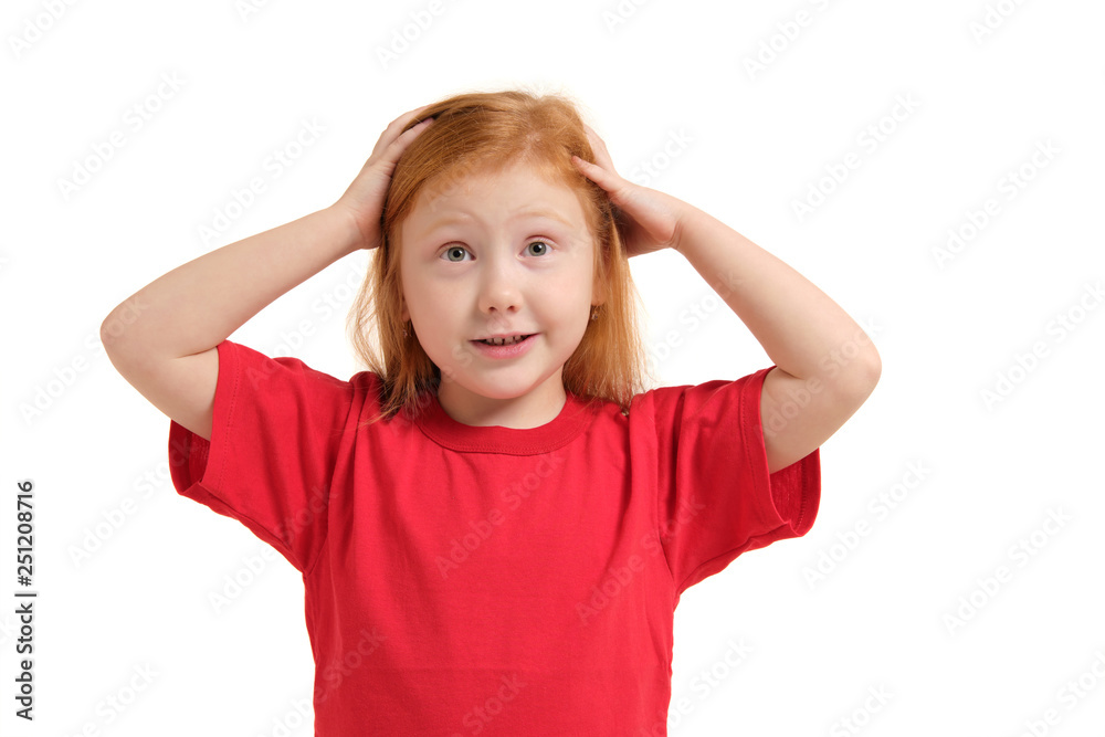 Portrait of cute redhead emotional little girl isolated on a white