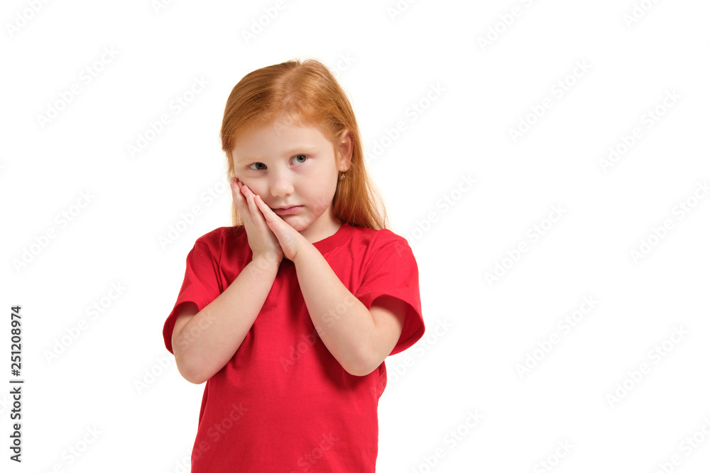 Portrait of cute redhead emotional little girl isolated on a white Portrait of cute redhead emotional little girl isolated on a white