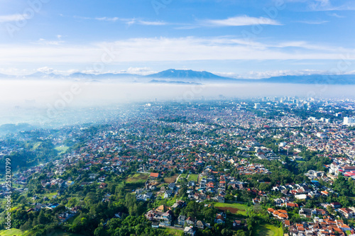 Beautiful Bandung cityscape with crowd houses photo