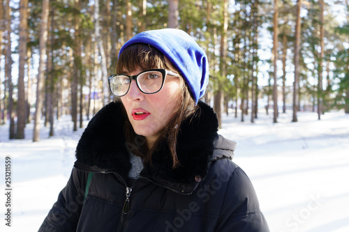 portrait of woman in winter park