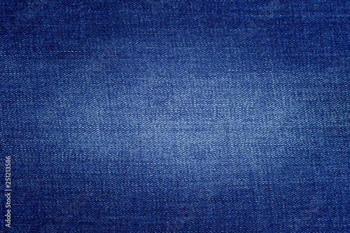 Denim fabric background. Manufacture and sale of denim fabric_