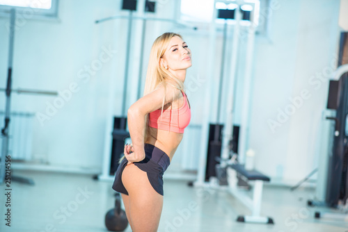 Strong woman weightlifting at the gym 