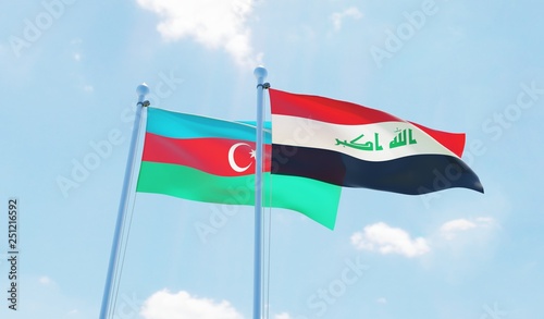 Iraq and Azerbaijan, , two flags waving against blue sky. 3d image