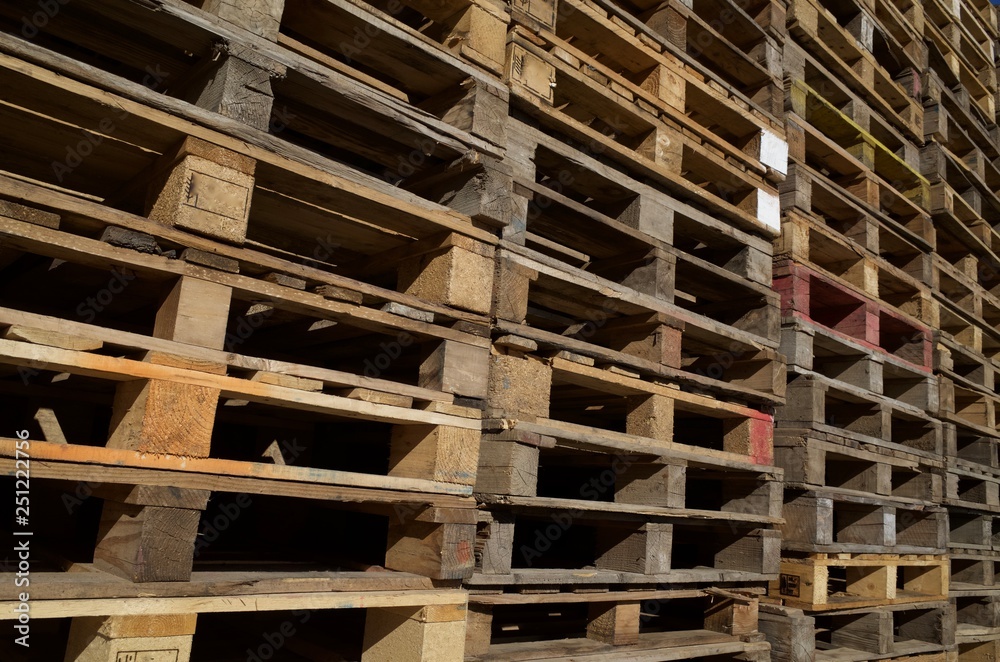 Stacked pallet boards, U.K. Recycle items. Stacked pallet boards, U.K. Recycle items.