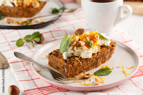 carrot fruit cake with nuts and cream